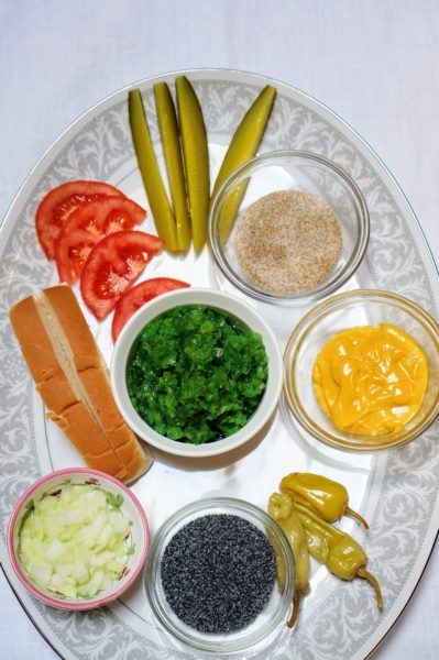 All ingredients Chicago style hot dog dragged through garden all fixings
